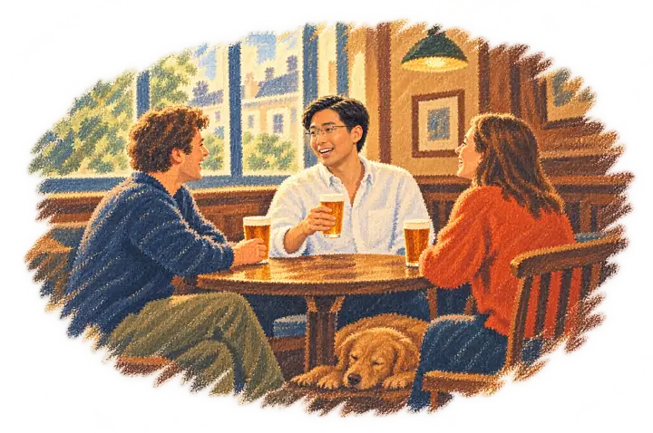 The young man back in a quiet London pub with two old friends and a pint, a dog asleep under the table